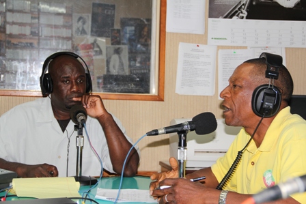 (l) Senior Extension Officer in the Department of Agriculture on Nevis Mr. Walcott James discussing the Department’s annual Agriculture Open Day with (r) Minister of Agriculture in the Nevis Island Administration and host of “On the Mark” programme at VON Radio and Hon. Alexis Jeffers
